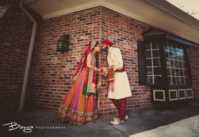 24a indian wedding bride and groom kiss