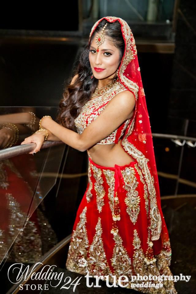 indian red and gold bridal lengha and matha patti