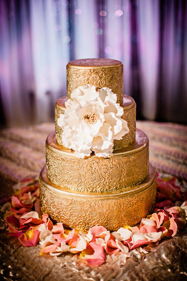 Gold gilded round 4 tier Indian wedding cake