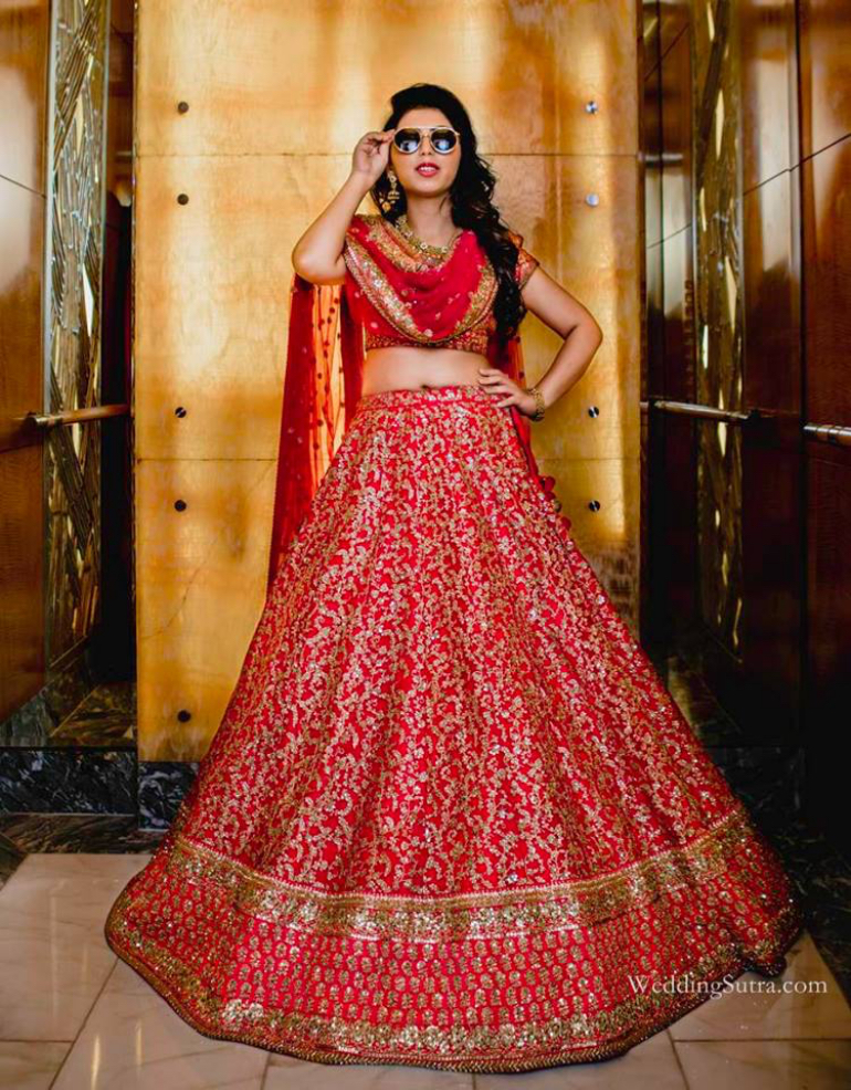 Dipti in traditional red - Art Leaves a Mark Dipti in traditional red - Art Leaves a Mark