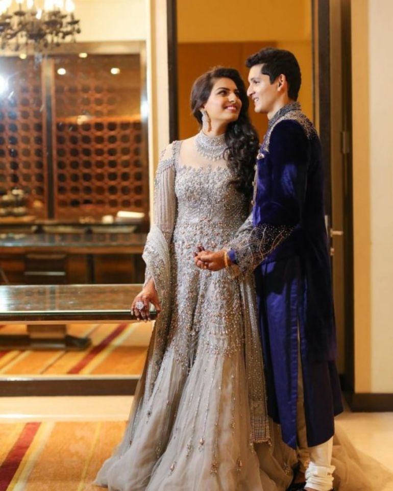 heavily embroidered cold shoulder silver gown - Israni Photography heavily embroidered cold shoulder silver gown - Israni Photography