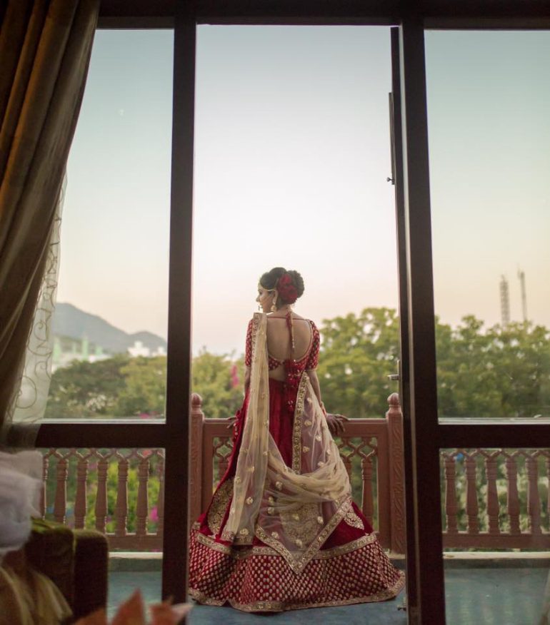 Natasha in Red and Gold lehenga