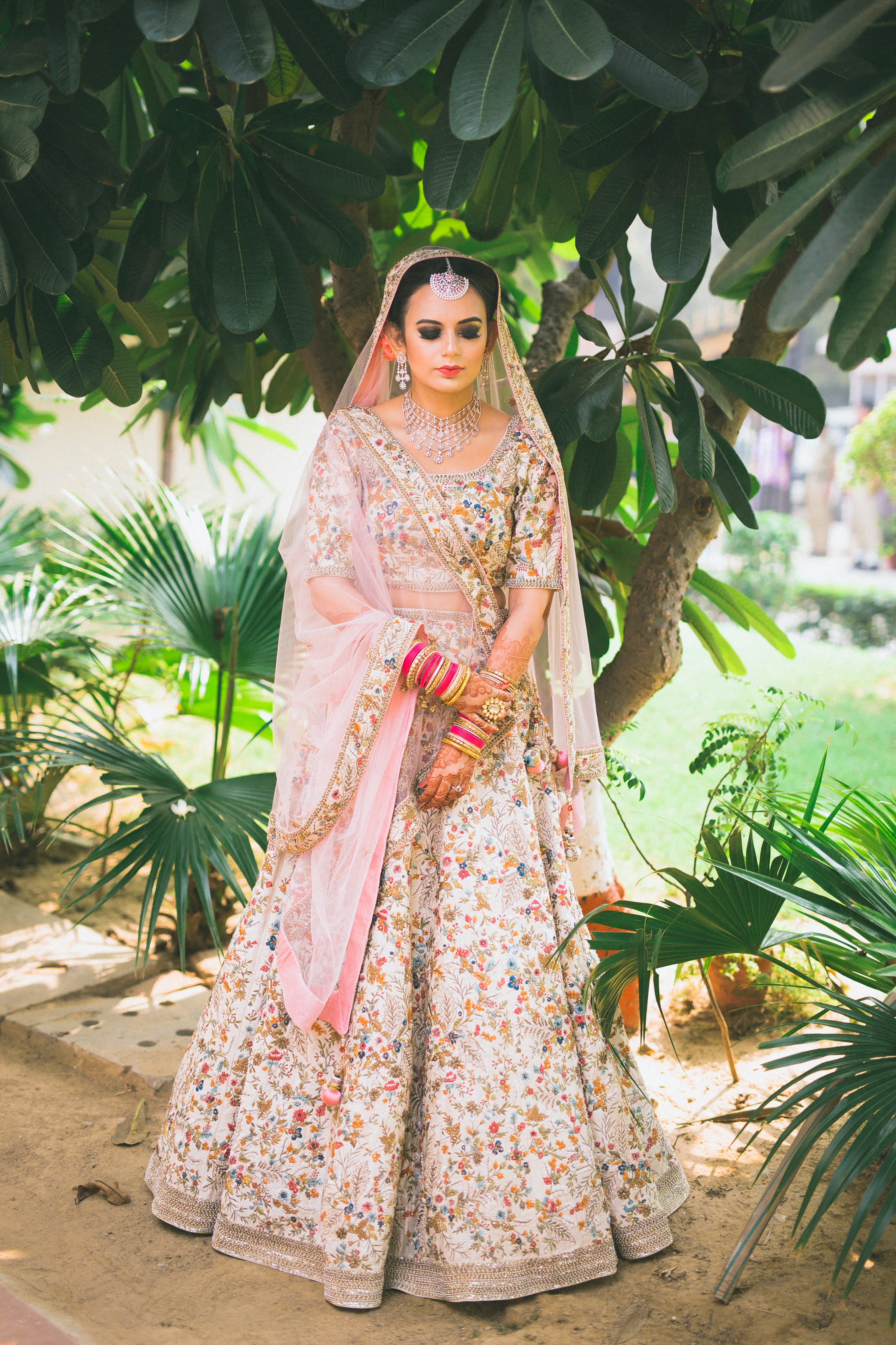white and pink bridal lehenga
