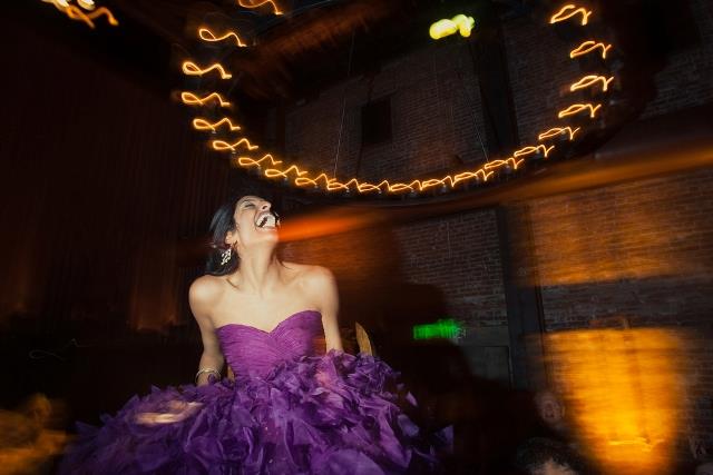AS12-Indian-bride-dancing-at-reception-in-California-in-purple-dress
