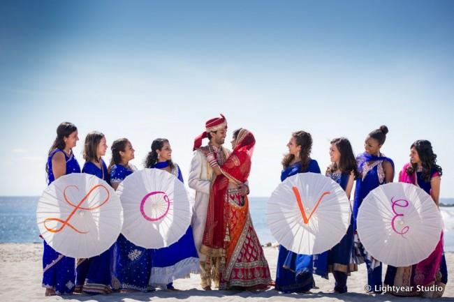 Bridal party with love umbrellas