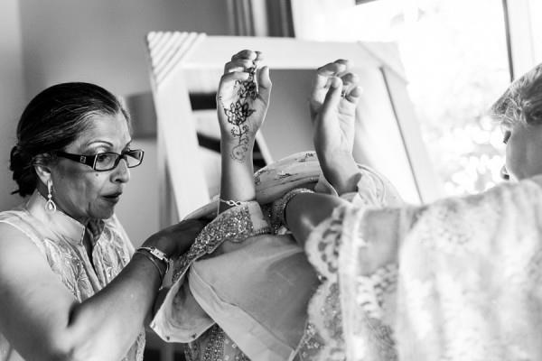 14a indian wedding bride getting dressed