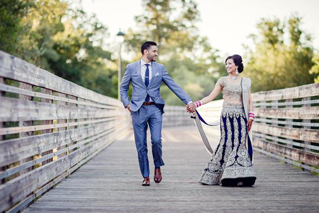 Bride and groom portrait with royal blue lehnga